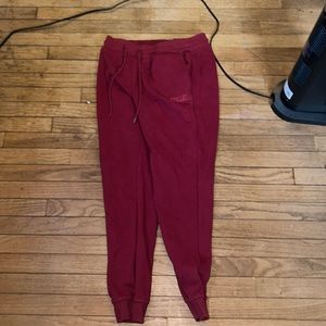 Red sweat pants.